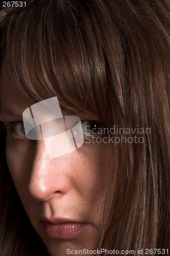 Image of woman portrait on black backdrop