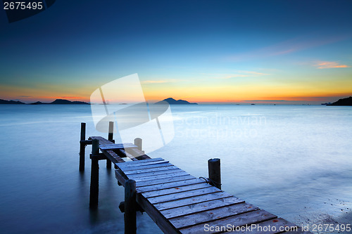 Image of Wooden jetty with sunset