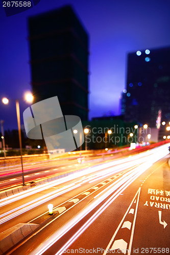 Image of Busy traffic car light on roadway