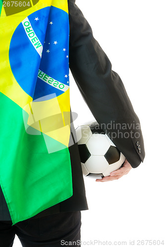 Image of Rear view of businessman with soccer ball and Brazil flag