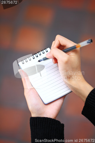 Image of Jot down on notebook