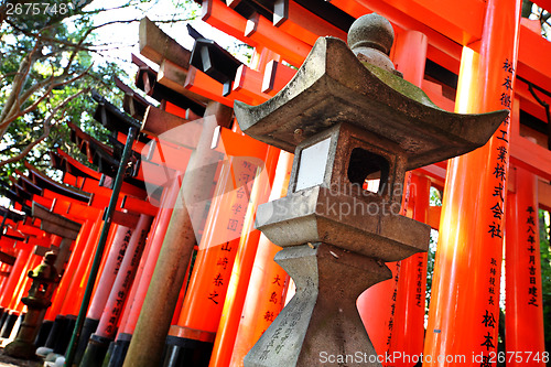 Image of Stone lantern with torii