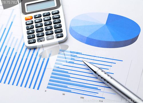 Image of Graphical chart with pen and calcultor