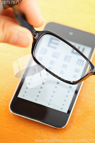 Image of Eyechart on mobile screen with eyewear