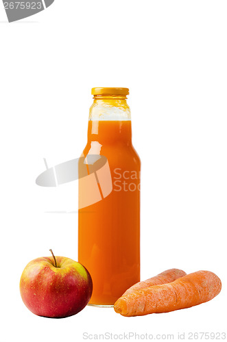 Image of Bottle with carrots juice and an apple