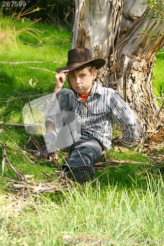 Image of Outback boy in rugged bushland