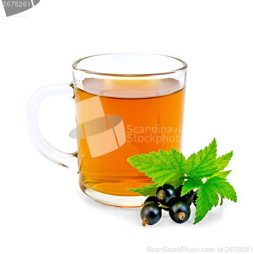 Image of Tea with black currant in glass mug