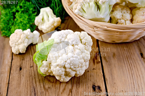 Image of Cauliflower with a basket on the board