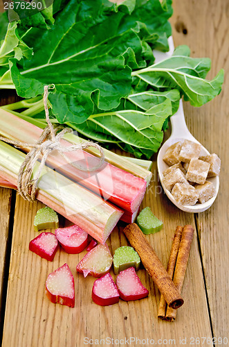 Image of Rhubarb on board with sugar and cinnamon