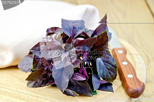 Image of Basil purple with a knife on board