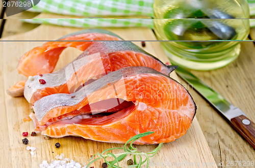 Image of Trout with oil and salt on board