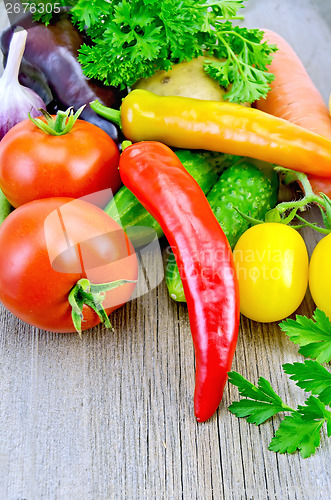 Image of Vegetables with garlic on a board