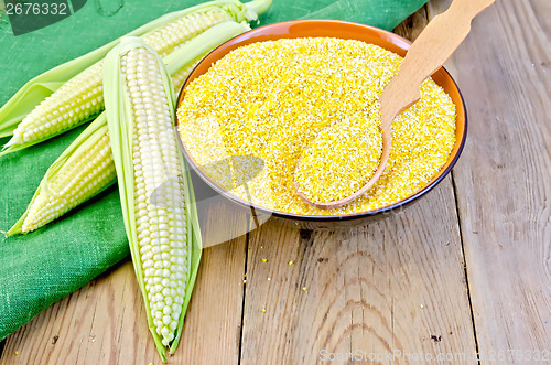 Image of Corn grits with corncobs and napkin