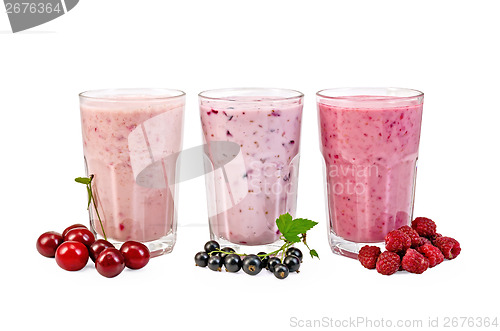 Image of Milkshakes with berries in glasses