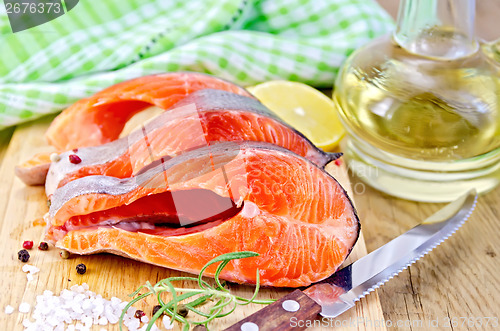 Image of Trout on board with oil and salt