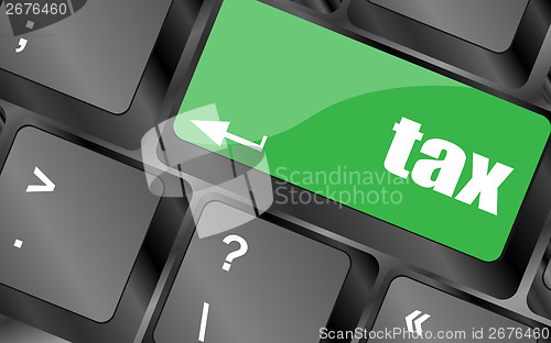 Image of tax green word on keyboard keys
