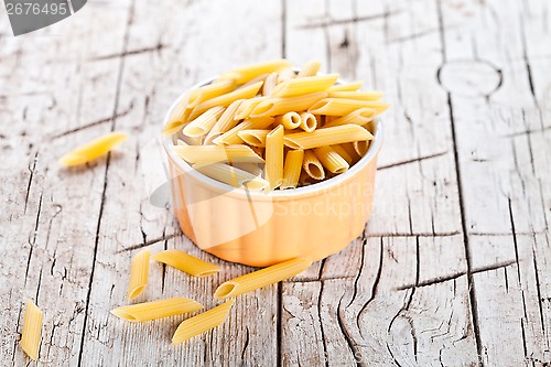 Image of uncooked pasta in a bowl 