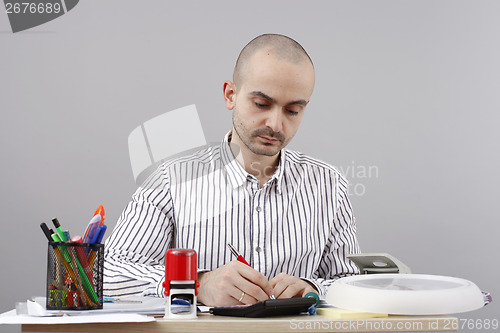 Image of Man at desk