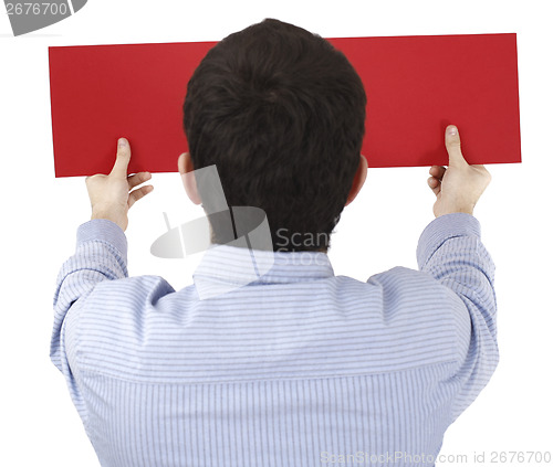 Image of Man holding a paper