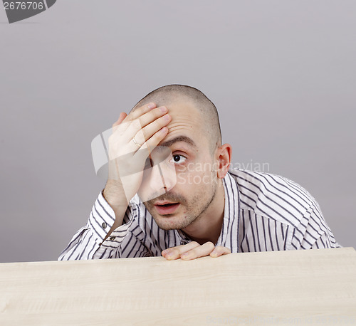 Image of Man at desk
