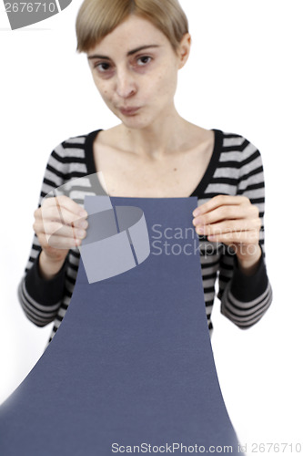 Image of Woman holding a paper