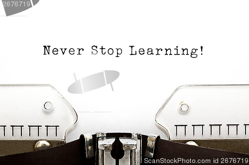 Image of Never Stop Learning Typewriter