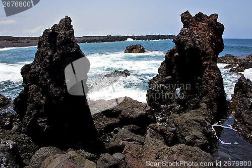 Image of rock spain   beach water  in lanzarote  isle foam  landscape  st