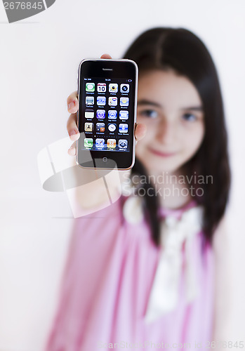 Image of Little girl with Apple IPhone 3s