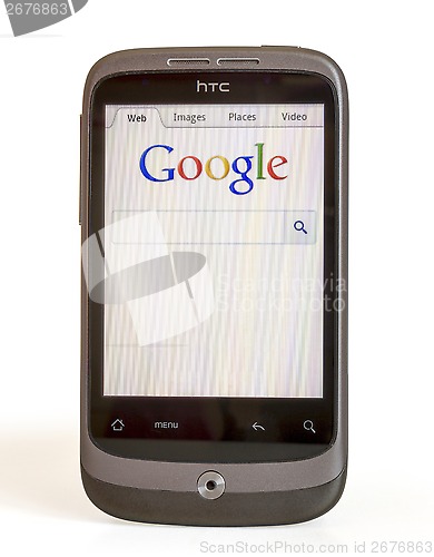 Image of HTC smart phone with Google page