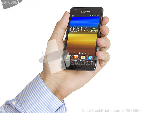 Image of Hand holding the Samsung Galaxy S2