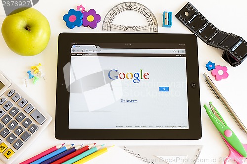 Image of Google on Ipad 3 with school accesories