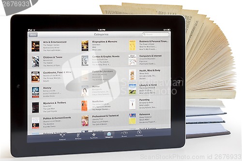 Image of Ipad 3 with app and books