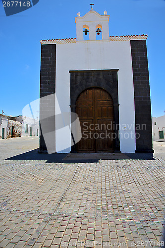 Image of bell tower    lanzarote  spain the old wall terrace church  in a