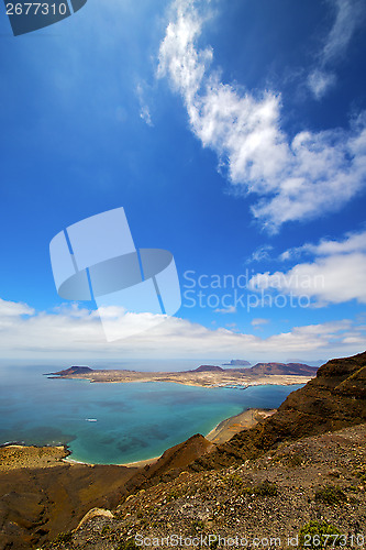 Image of spain miramar harbor rock stone  yacht water  in lanzarote  grac