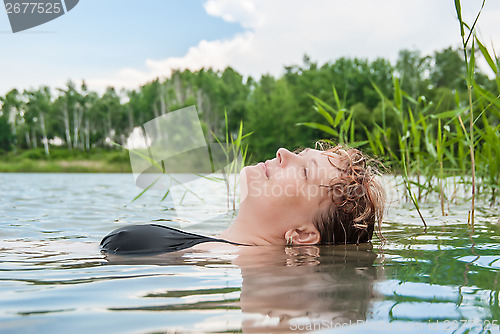 Image of The woman in water