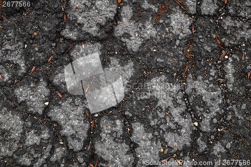 Image of Tarmac road with big holes in Belgium