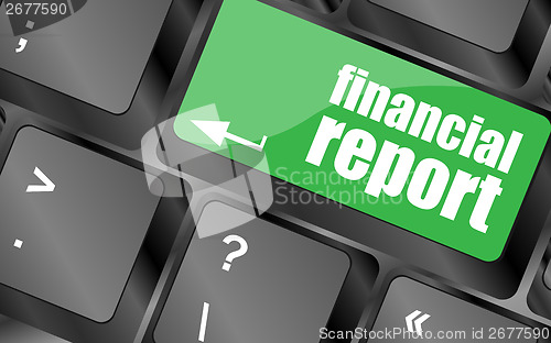 Image of keyboard key with financial report button