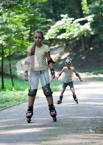 Image of Kids rollerblading