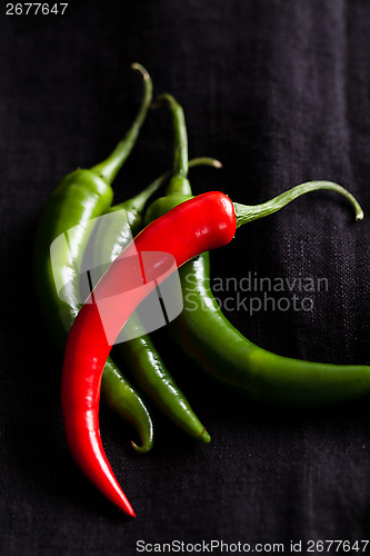 Image of Red and green chili peppers