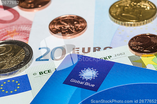 Image of Tax Free plastic card from company Global Blue on banknotes