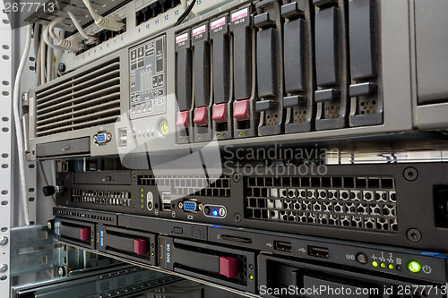 Image of servers stack with hard drives in a datacenter