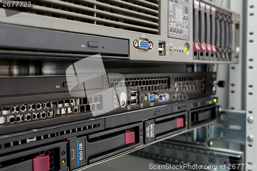 Image of servers stack with hard drives in a datacenter