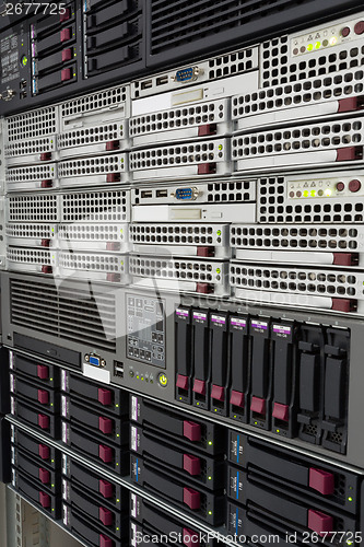 Image of servers stack with hard drives in a datacenter