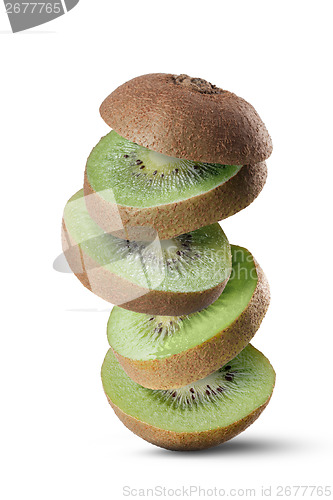 Image of Falling slices of kiwi fruit isolated on white background