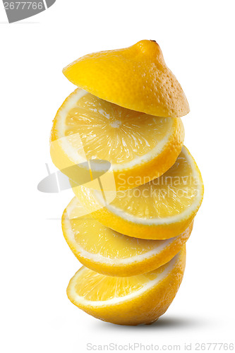 Image of Falling slices of lemon isolated on white background