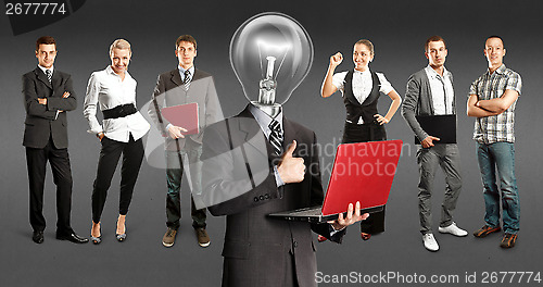 Image of Business Team With Lamp Head
