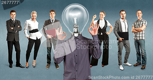 Image of Business Team With Lamp Head