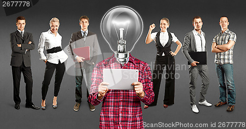 Image of Business Team With Lamp Head