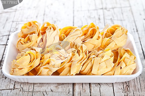 Image of raw egg pasta in a plate 