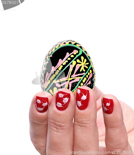 Image of  Painted Easter egg woman hand